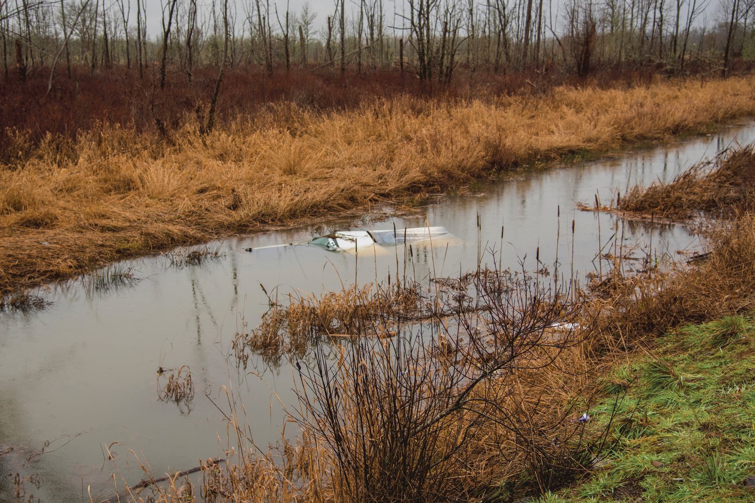 A vehicle remains submerged in the 2100 block of North National Avenue in Chehalis Wednesday morning.